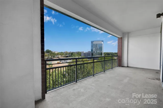 a view of a balcony and an outdoor space