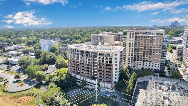 a view of a city with tall buildings