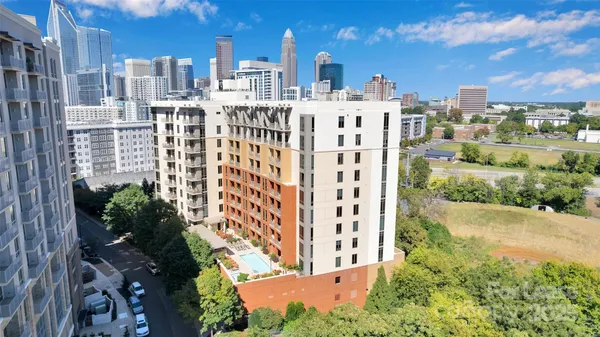 a view of a city with tall buildings