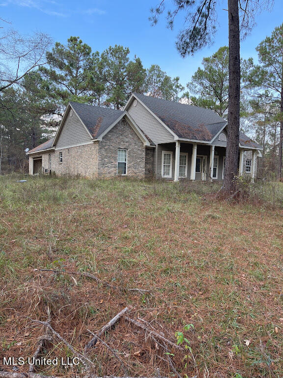 5990 Tank Road Terry, MS 39170 - Photo 3 of 26 Left Side of Property Full View