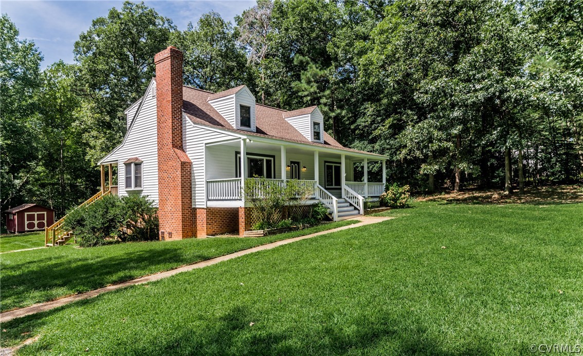 4900 North Courthouse Road Providence Forge, VA 23140 - Photo 1 of 50 a front view of house with yard and green space
