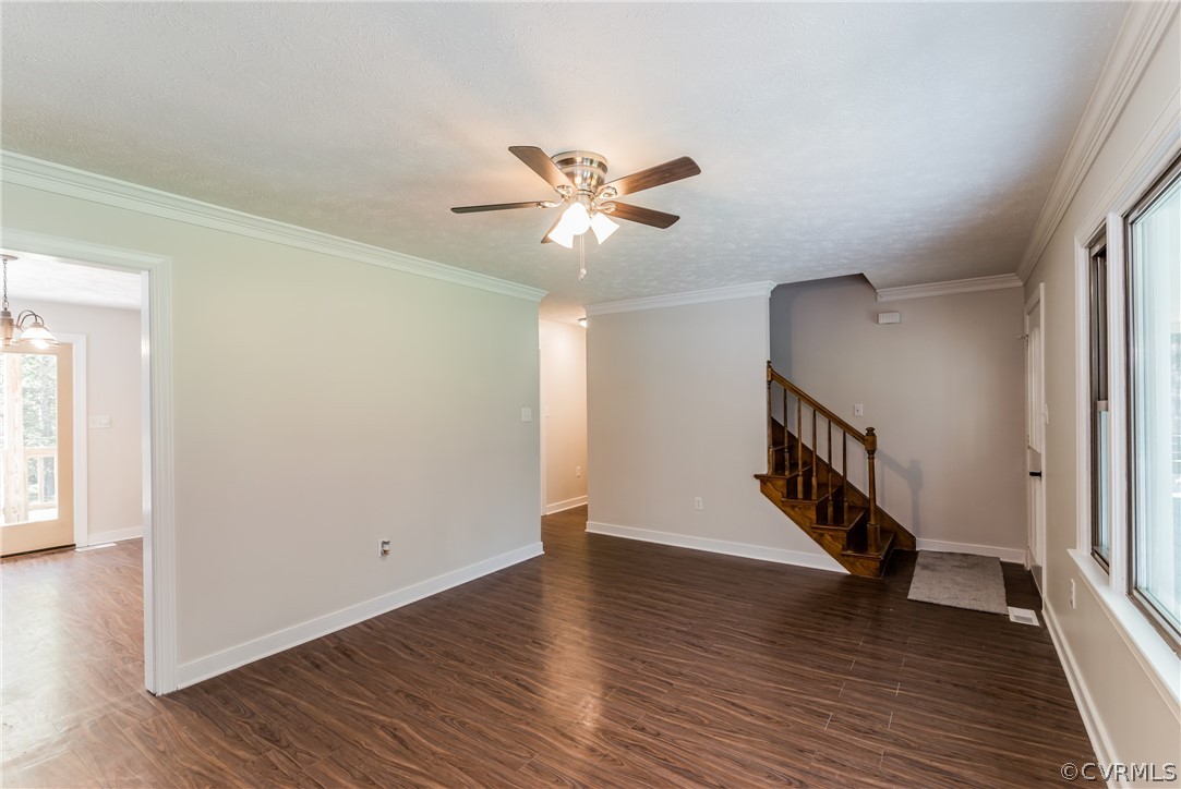 4900 North Courthouse Road Providence Forge, VA 23140 - Photo 17 of 50 a view of an empty room with wooden floor and a ceiling fan