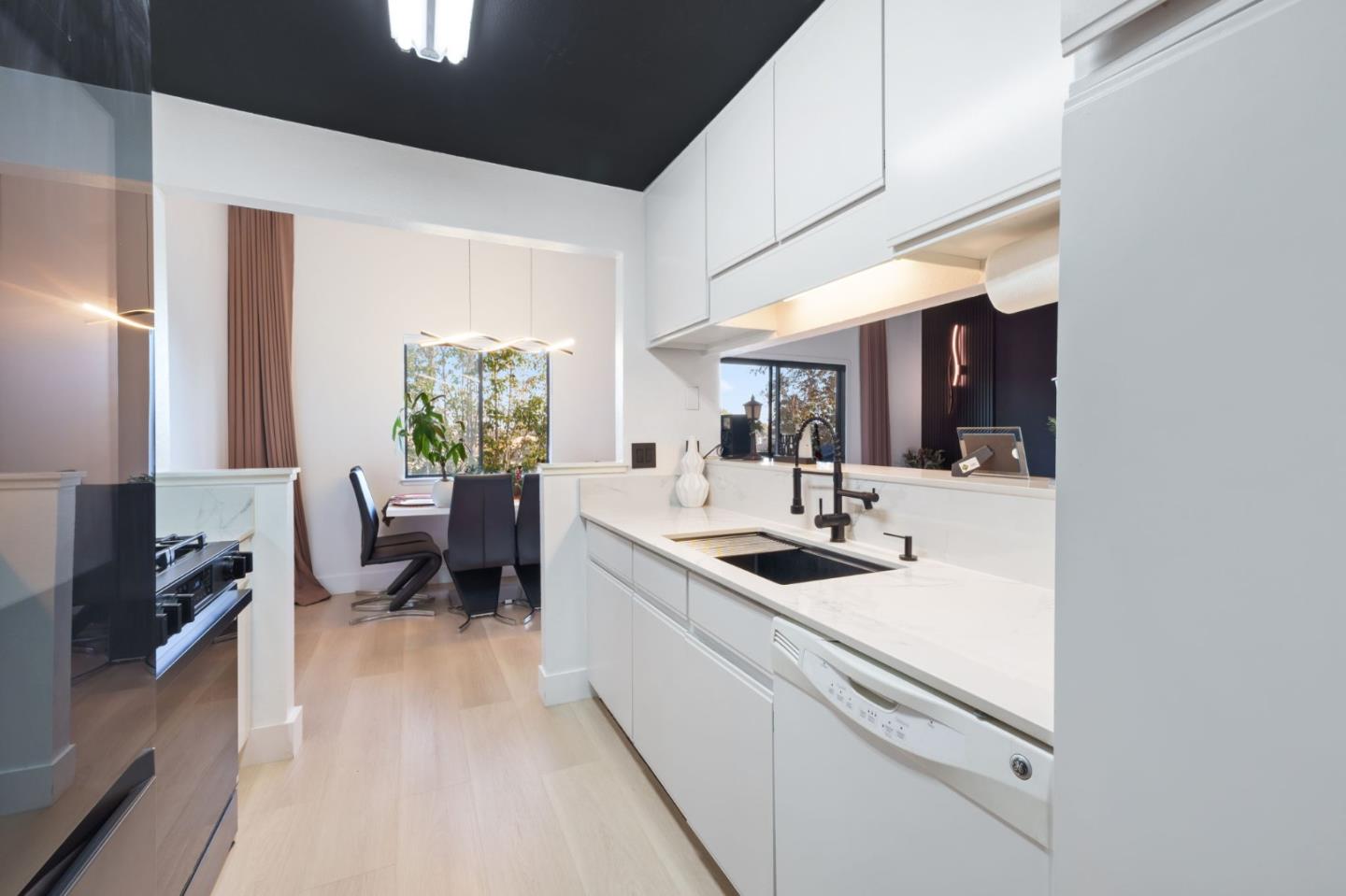 2422 North Main Street, Unit F Salinas, CA 93906 - Photo 13 of 22 a living room with furniture and a large window