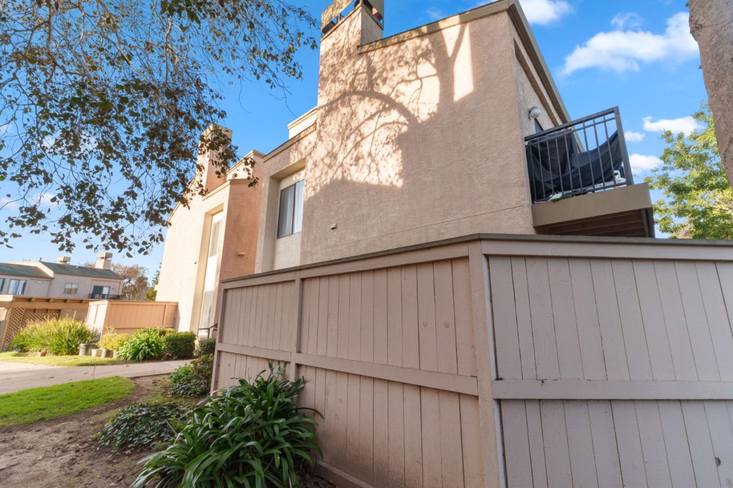 2422 North Main Street, Unit F Salinas, CA 93906 - Photo 4 of 22 a view of a house with a backyard