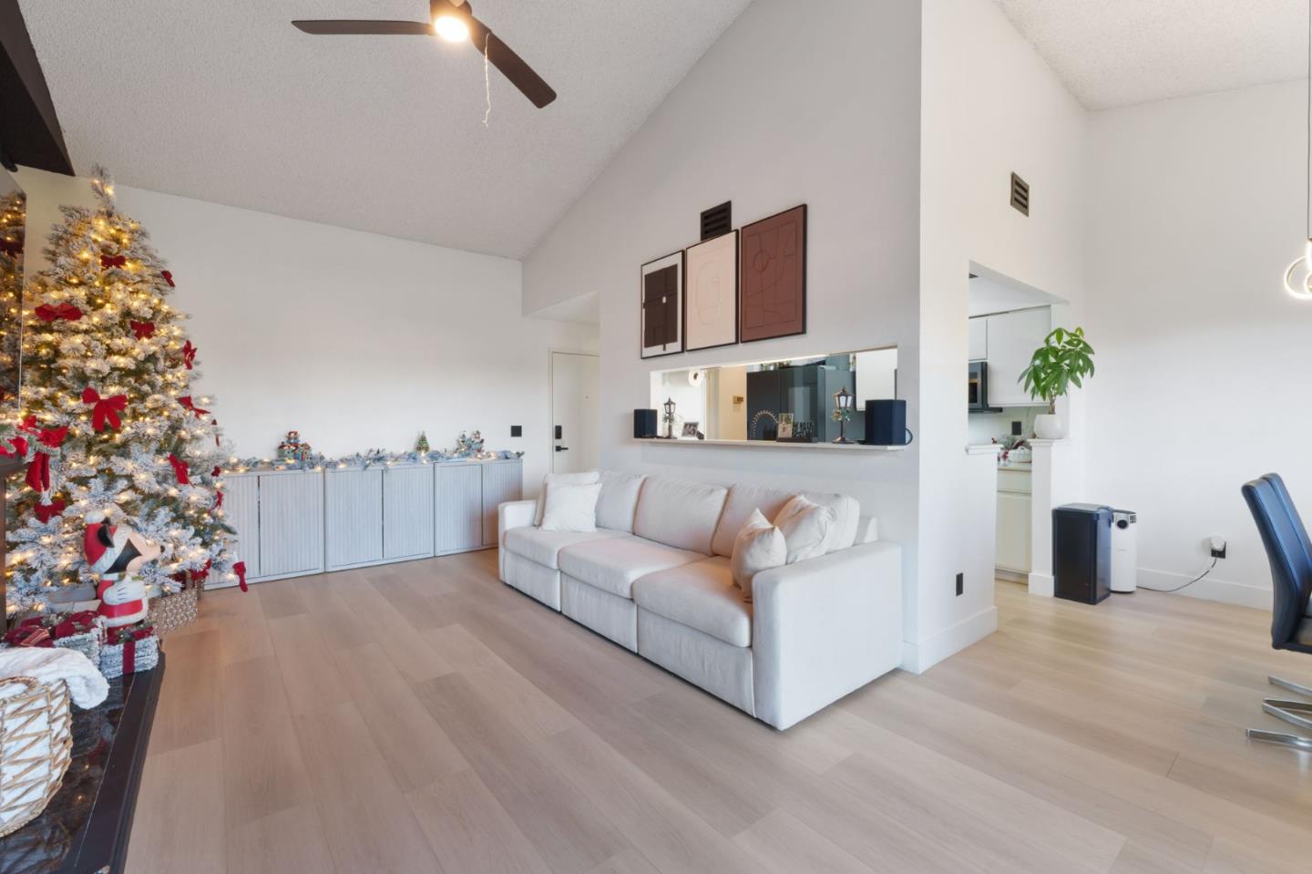 2422 North Main Street, Unit F Salinas, CA 93906 - Photo 7 of 22 a living room with furniture and flowers