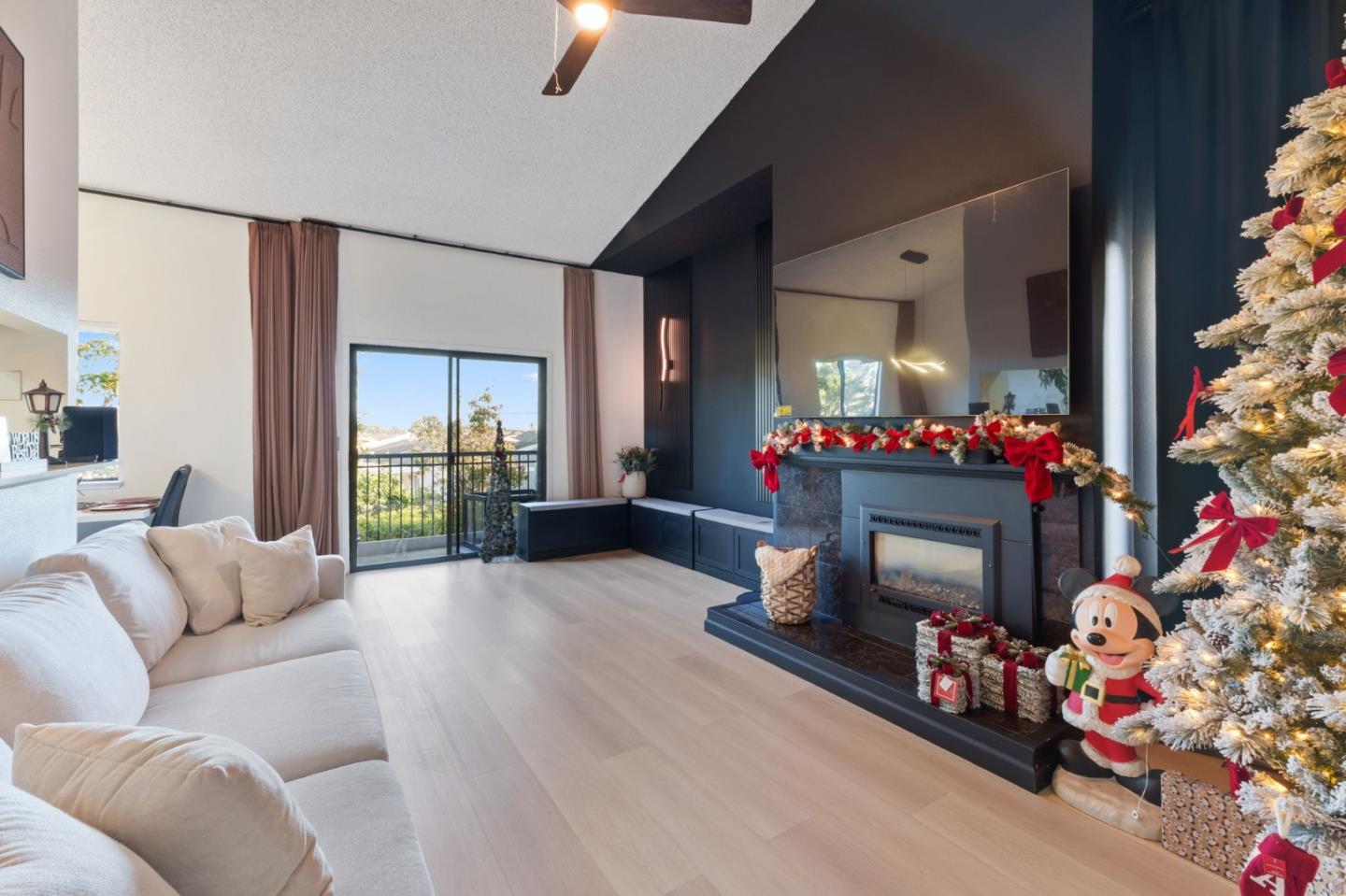 2422 North Main Street, Unit F Salinas, CA 93906 - Photo 8 of 22 a living room with furniture and a fireplace