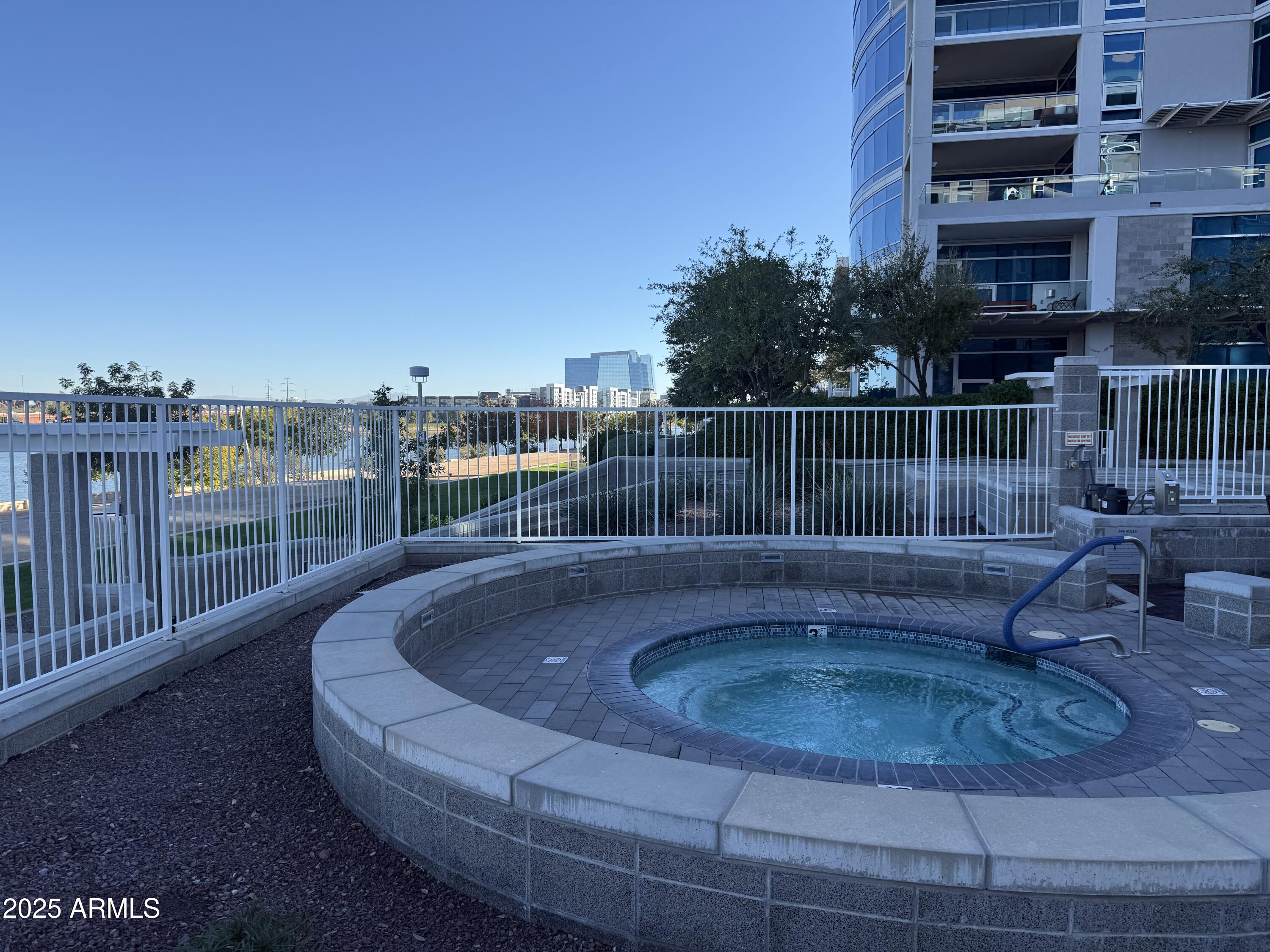 120 East Rio Salado Parkway, Unit 301 Tempe, AZ 85281 - Photo 37 of 42 East facing Over the hot tub to the lake