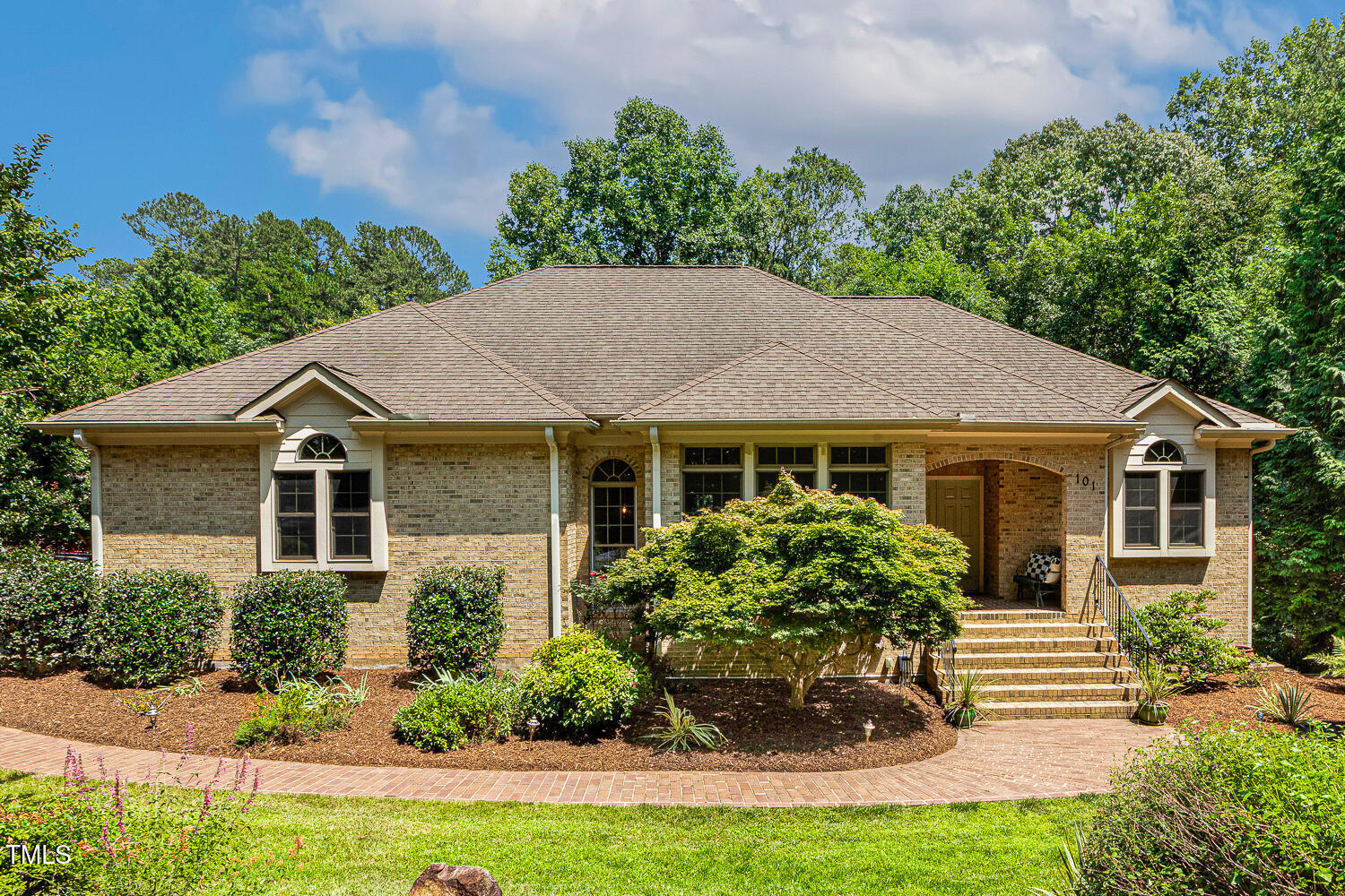101 Cardiff Place Chapel Hill, NC 27516 - Photo 2 of 82 front view of a house with a yard