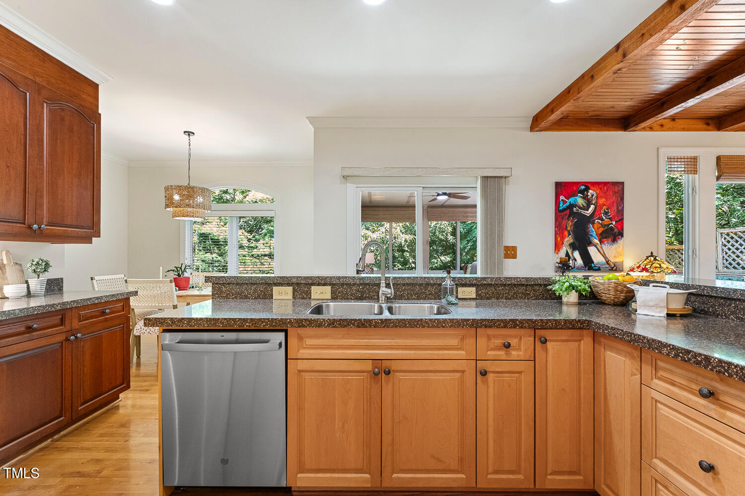 101 Cardiff Place Chapel Hill, NC 27516 - Photo 22 of 82 a kitchen with kitchen island granite countertop a sink and cabinets