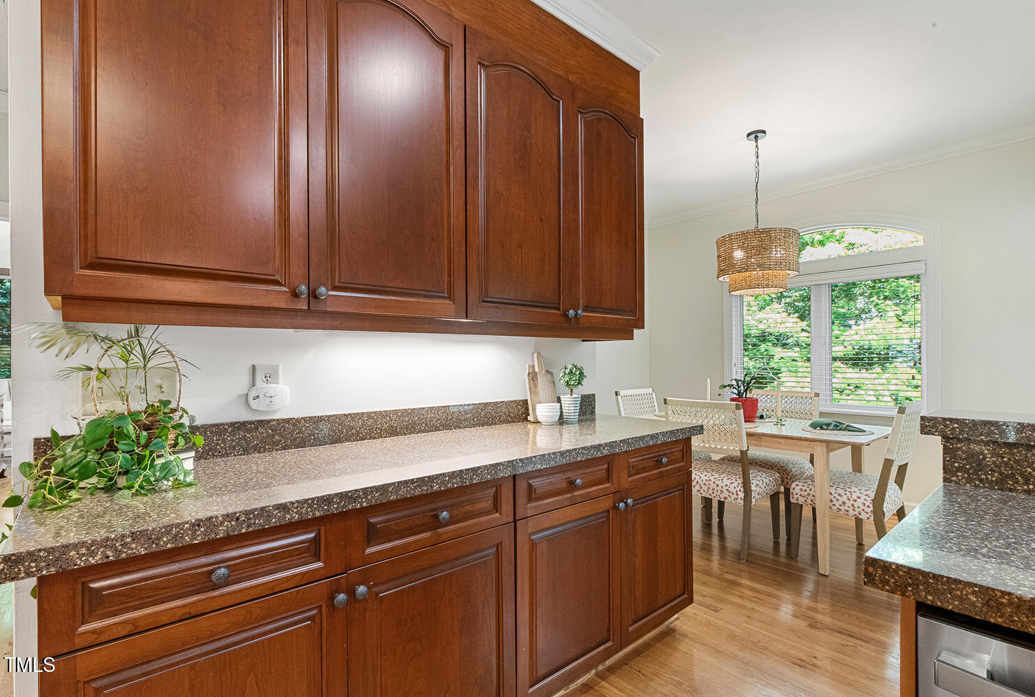 101 Cardiff Place Chapel Hill, NC 27516 - Photo 23 of 82 a kitchen with a sink and cabinets