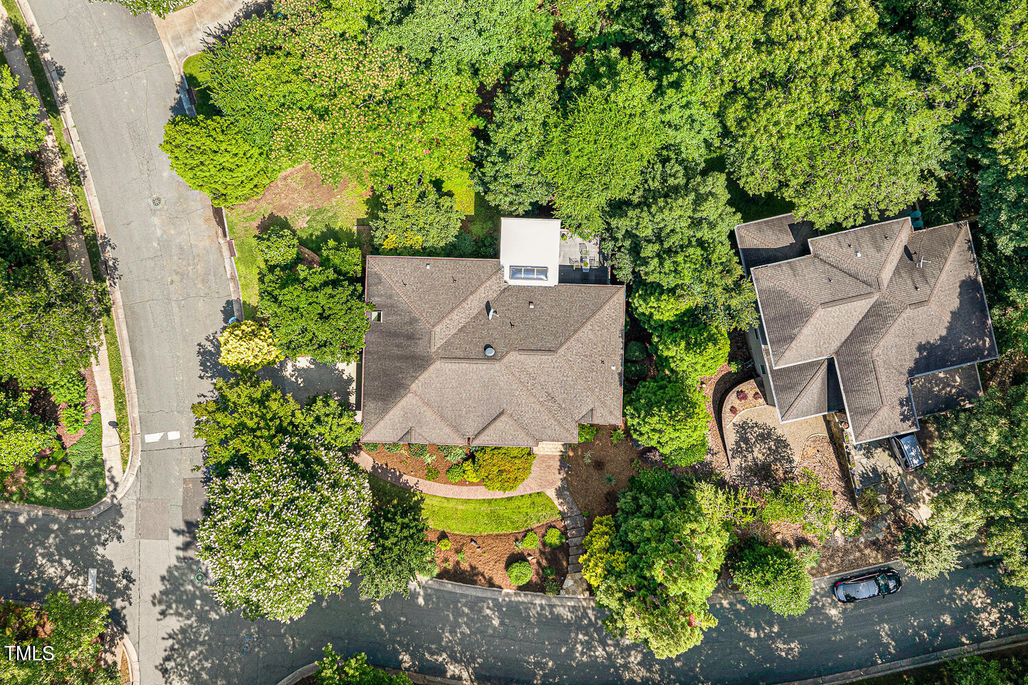101 Cardiff Place Chapel Hill, NC 27516 - Photo 4 of 82 an aerial view of a house with swimming pool and garden space