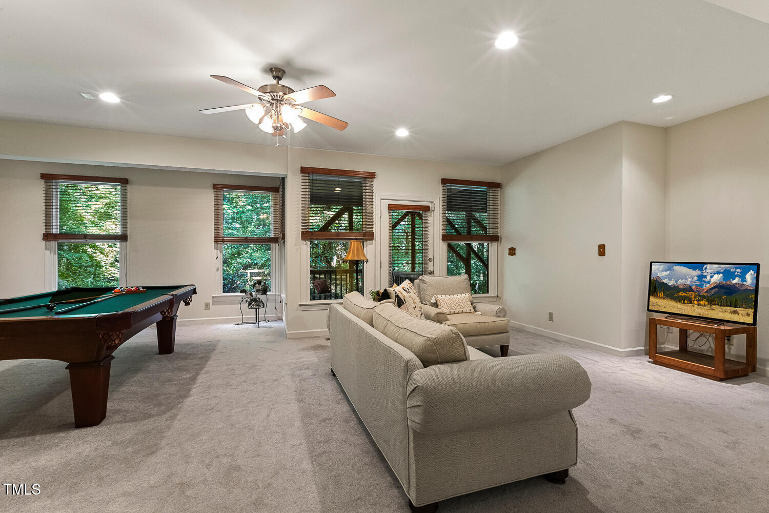 101 Cardiff Place Chapel Hill, NC 27516 - Photo 51 of 82 a living room with furniture and a large window