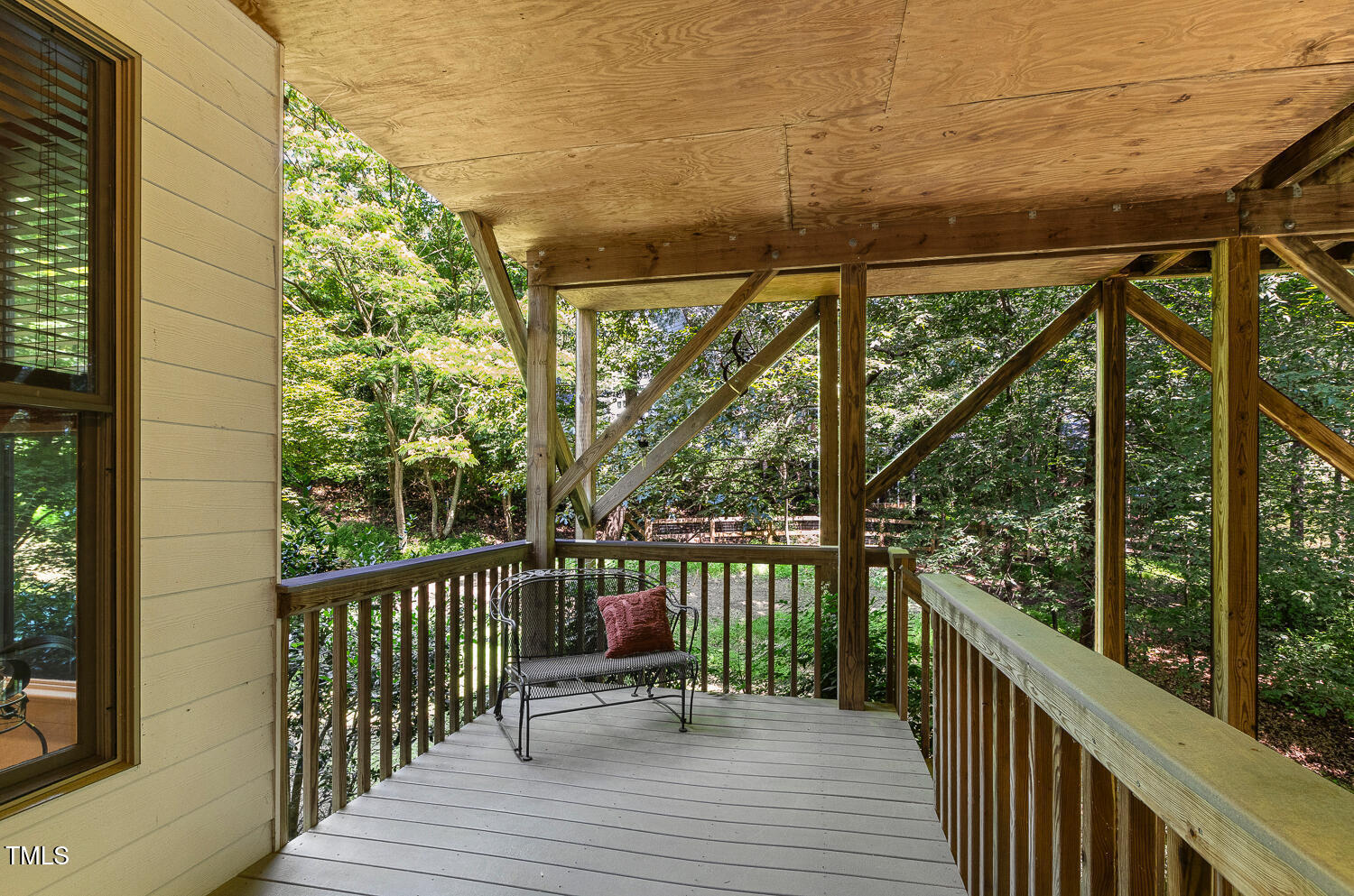 101 Cardiff Place Chapel Hill, NC 27516 - Photo 69 of 82 a view of a balcony with wooden floor next to a iron stairs
