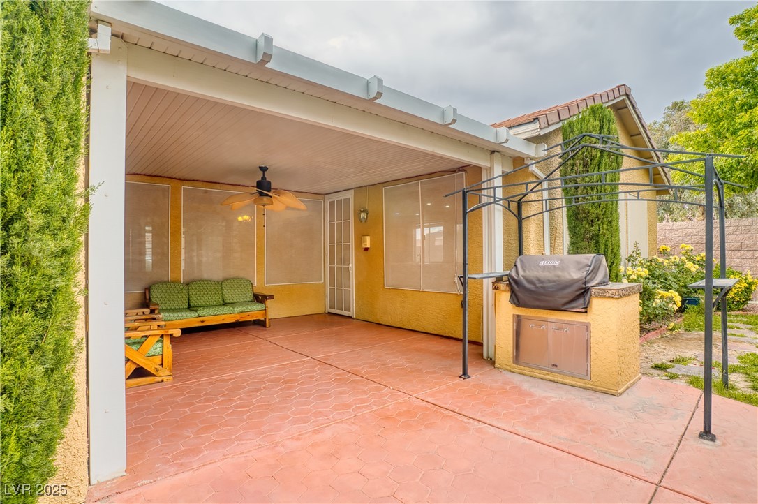2383 Rainswept Avenue Henderson, NV 89052 - Photo 37 of 62 View of patio featuring area for grilling and a ceiling fan