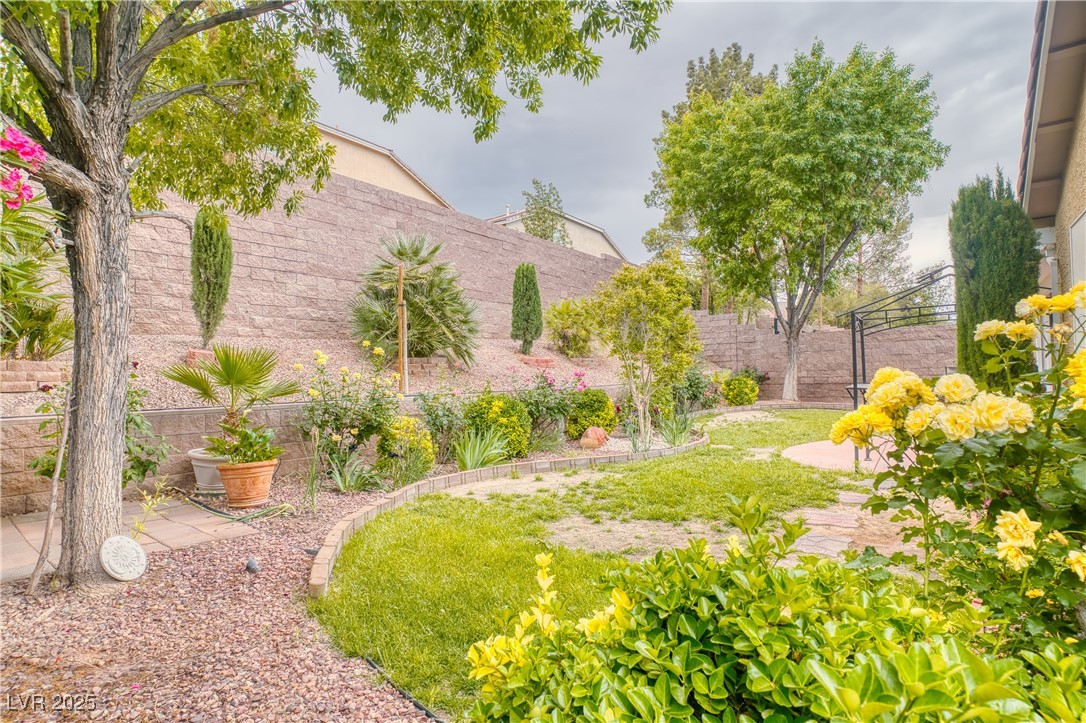 2383 Rainswept Avenue Henderson, NV 89052 - Photo 41 of 62 Fenced backyard featuring a patio area