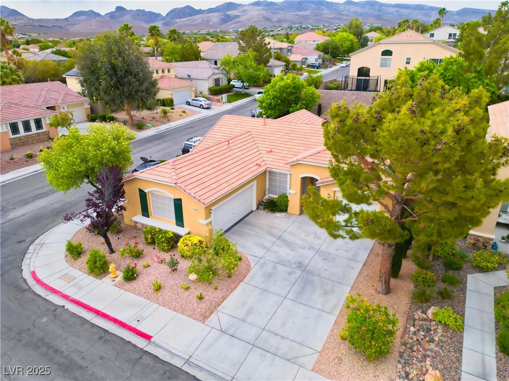 2383 Rainswept Avenue Henderson, NV 89052 - Photo 47 of 62 Aerial perspective of suburban area featuring a mountainous background