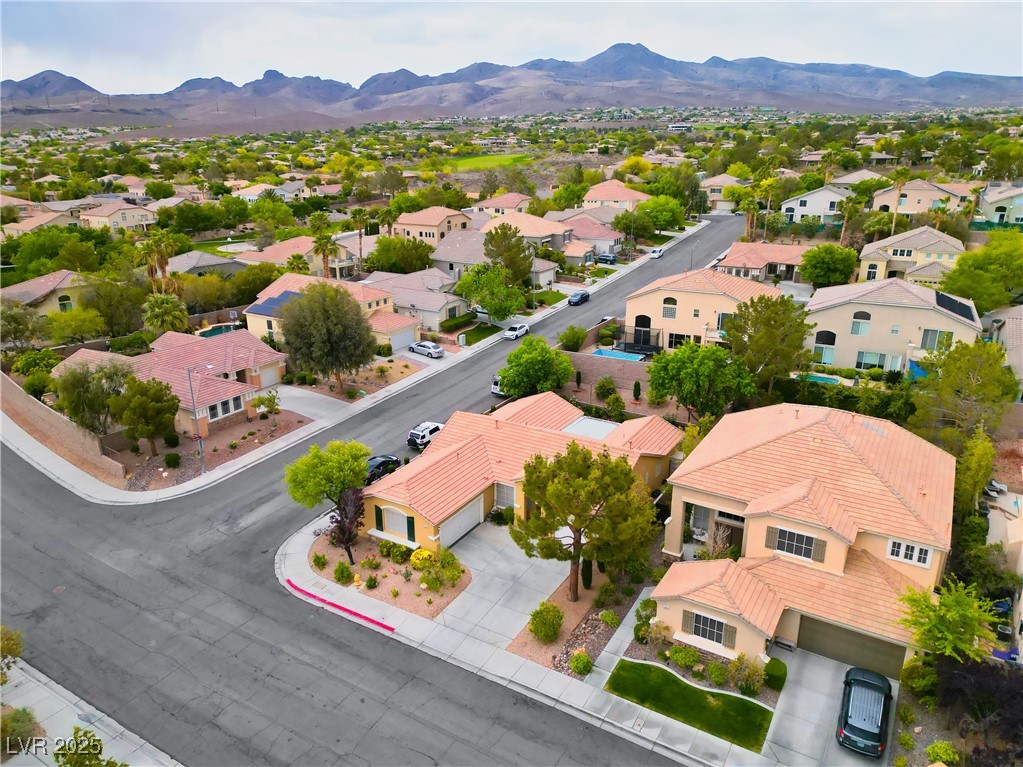 2383 Rainswept Avenue Henderson, NV 89052 - Photo 56 of 62 Aerial view of residential area with a mountain backdrop