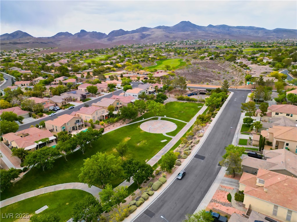 2383 Rainswept Avenue Henderson, NV 89052 - Photo 57 of 62 Aerial overview of property's location featuring a mountainous background and nearby suburban area