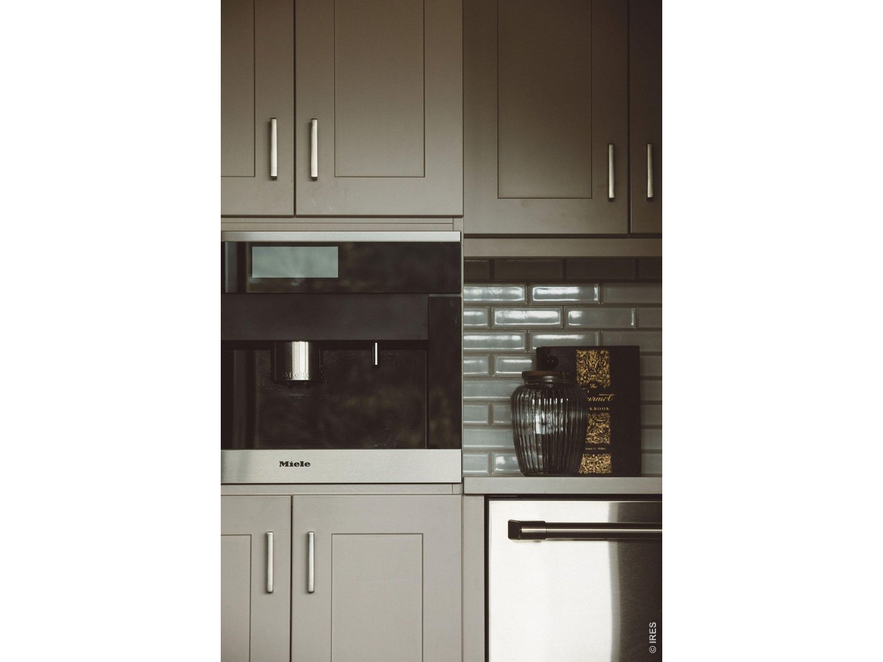 16132 Steller Ridge Road Loveland, CO 80538 - Photo 17 of 50 Built in Miele espresso machine waiting to deliver the perfect morning coffee