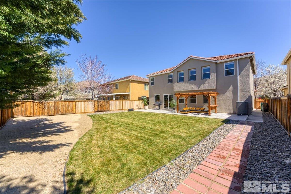 11215 Torino Way Reno, NV 89521 - Photo 21 of 21 a front view of a house with a yard