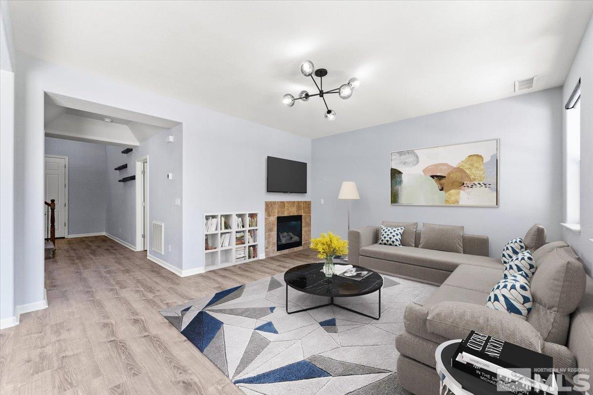 11215 Torino Way Reno, NV 89521 - Photo 7 of 21 a living room with furniture and a fireplace