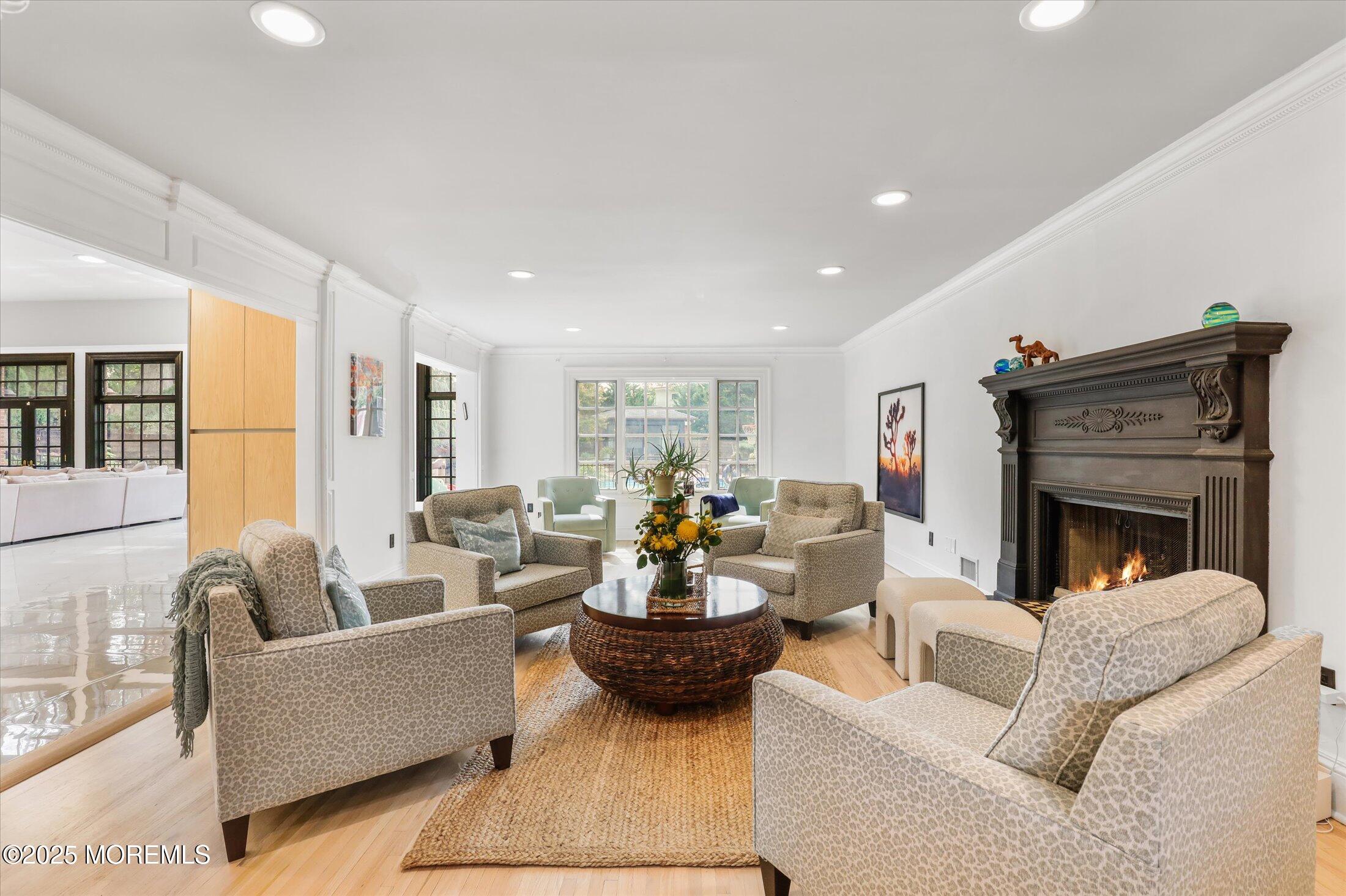 13 Valley Forge Road Eatontown, NJ 07724 - Photo 12 of 74 a living room with furniture and a fireplace