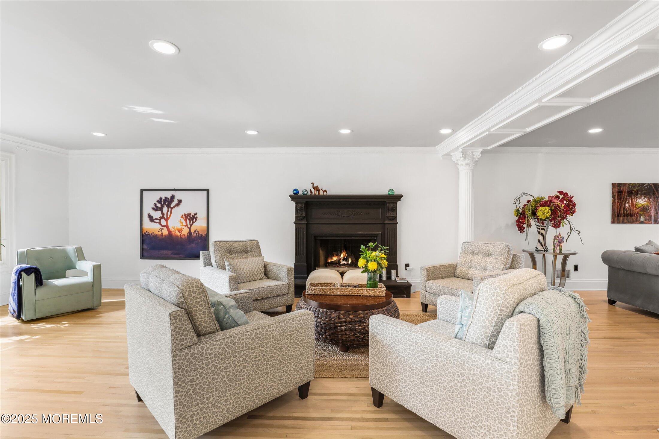 13 Valley Forge Road Eatontown, NJ 07724 - Photo 13 of 74 a living room with furniture and a fireplace