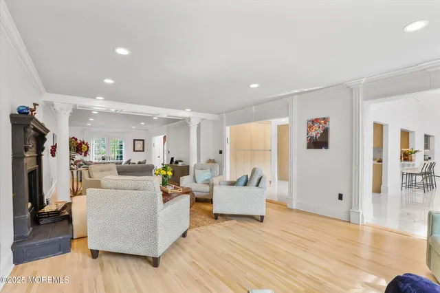 a large kitchen with stainless steel appliances granite countertop a lot of counter space and a sink