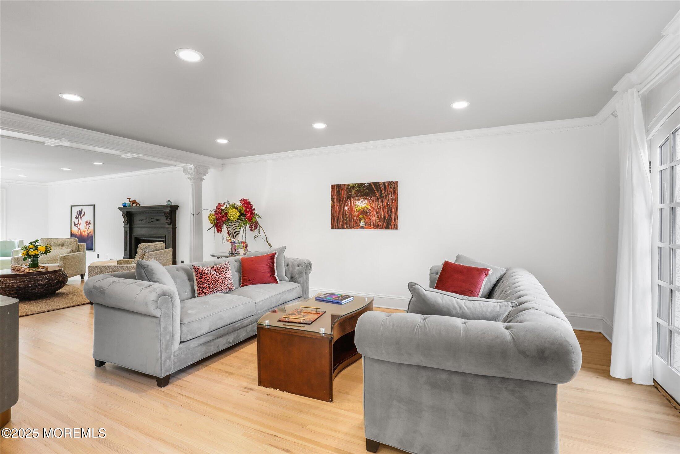 13 Valley Forge Road Eatontown, NJ 07724 - Photo 15 of 74 a living room with furniture and a flat screen tv