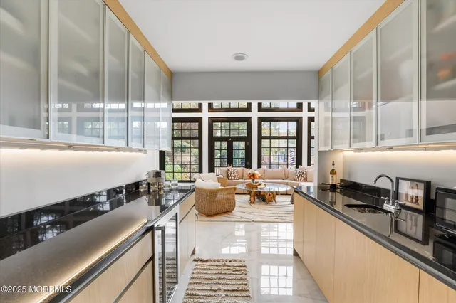 a view of hallway with wooden floor