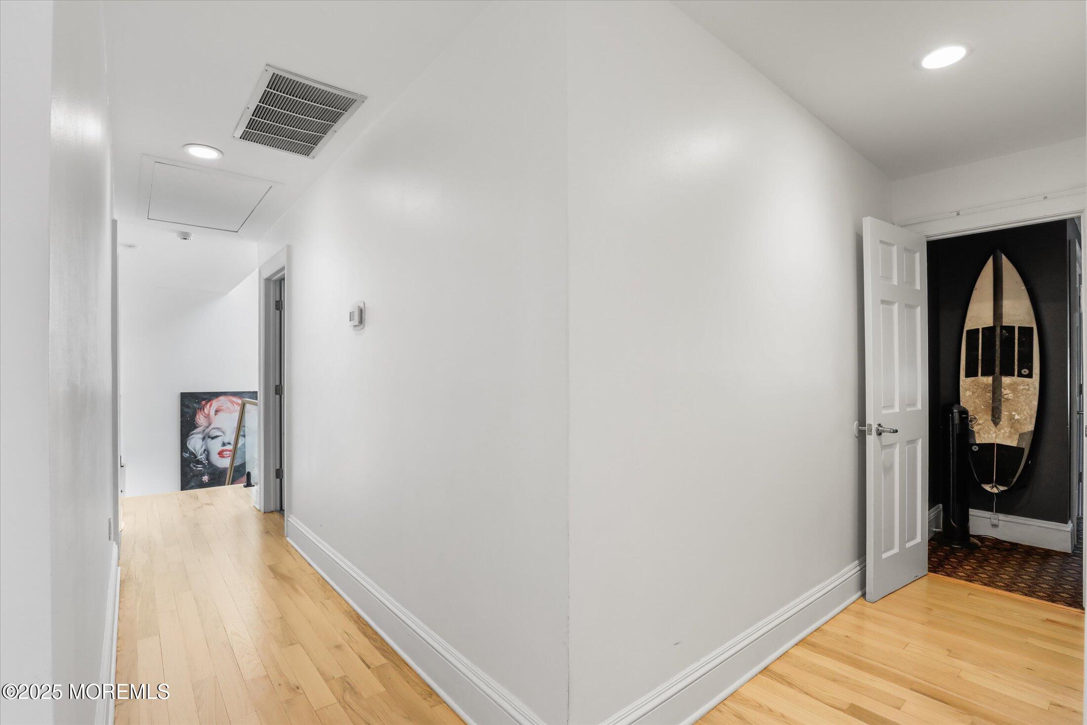 13 Valley Forge Road Eatontown, NJ 07724 - Photo 44 of 74 a view of hallway with wooden floor