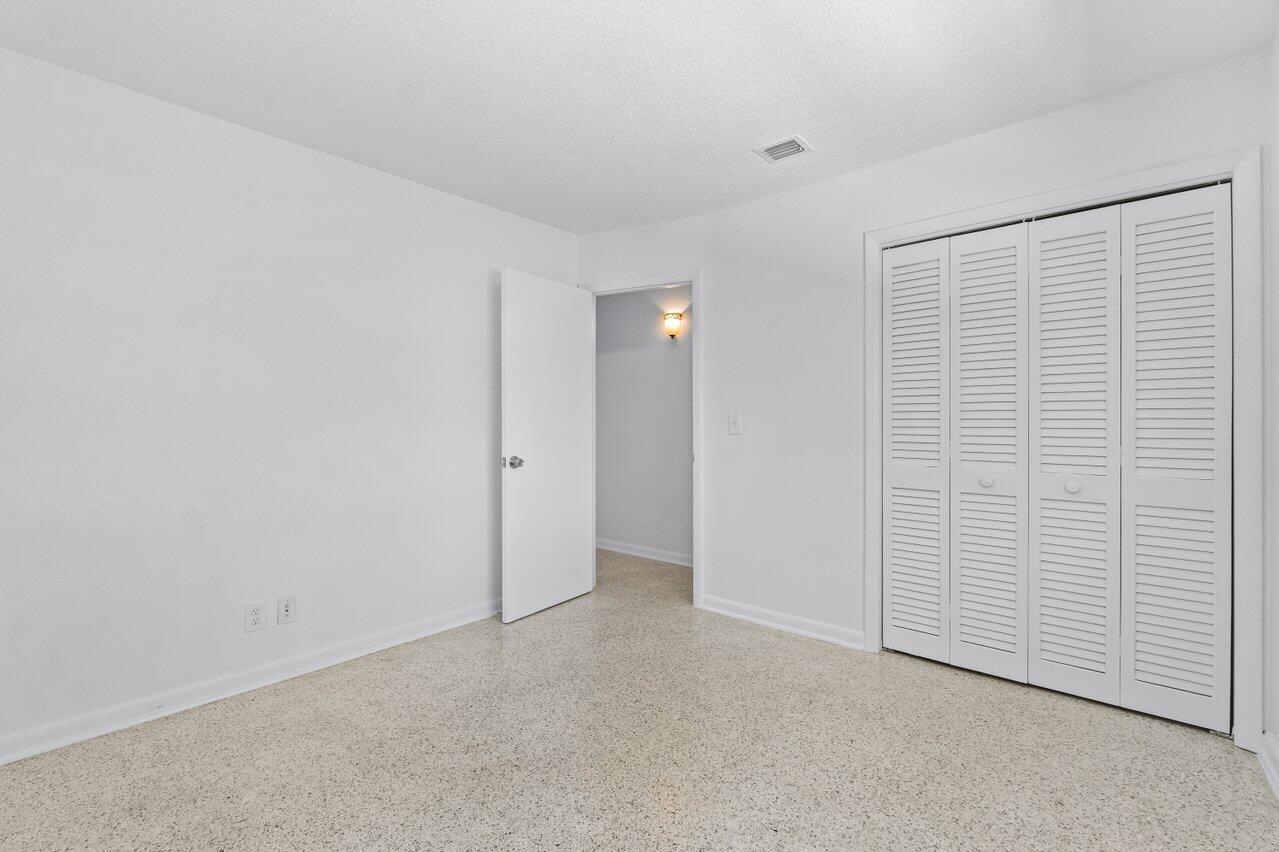 751 Hummingbird Way, Unit 7 North Palm Beach, FL 33408 - Photo 16 of 39 a view of an empty room
