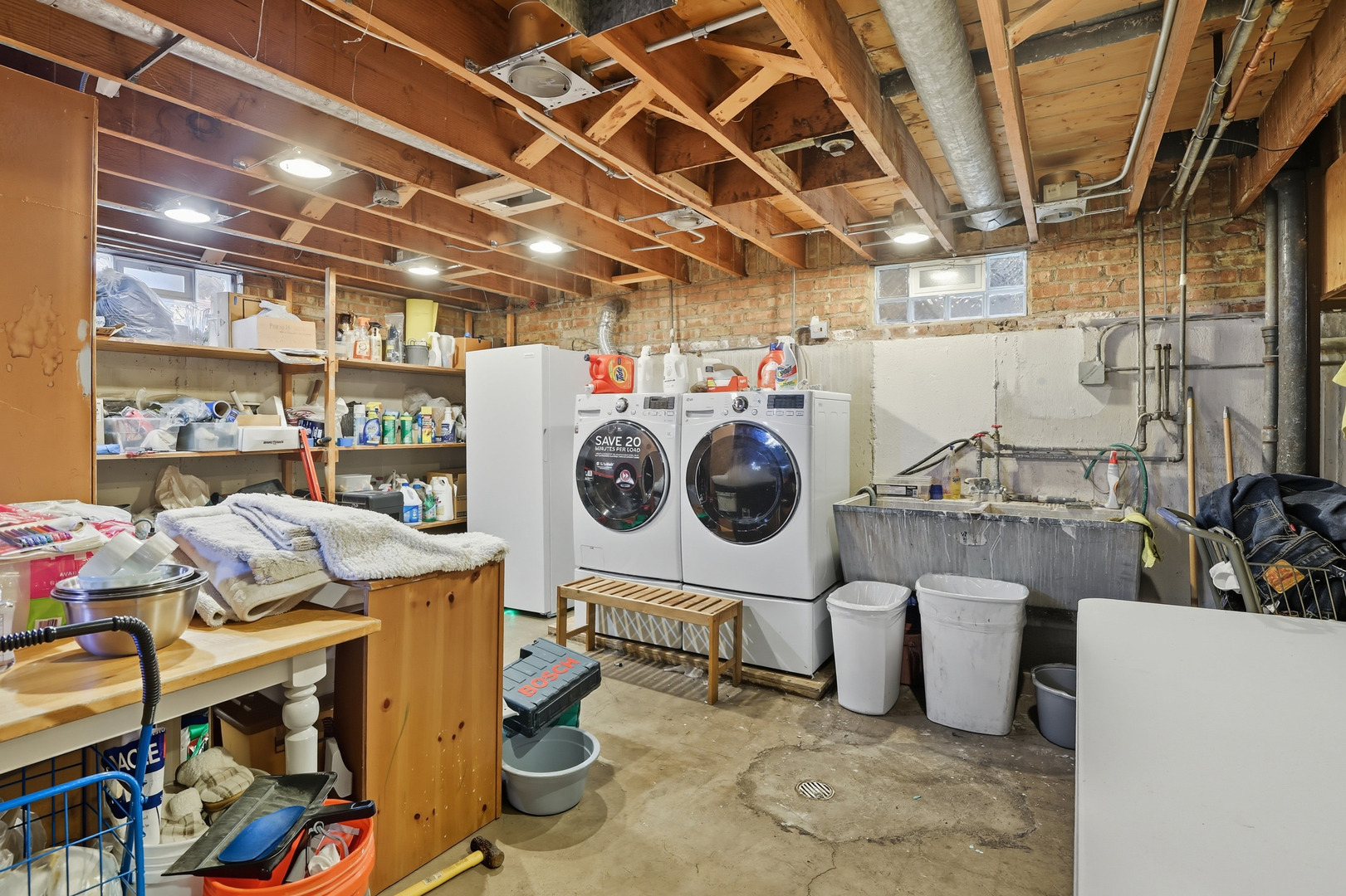 8728 Trumbull Avenue Skokie, IL 60076 - Photo 15 of 18 a utility room with a refrigerator and washer