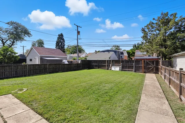 a view of a backyard with a garden