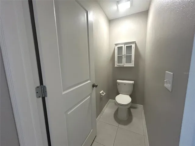 a bathroom with a toilet and a sink