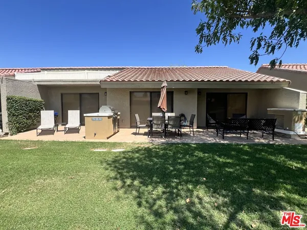a view of a house with patio