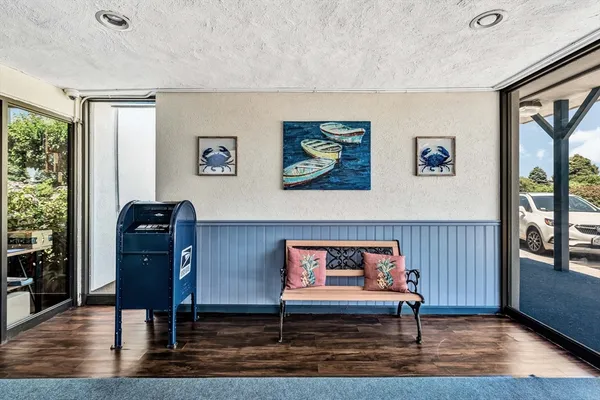 a living room with furniture and a window