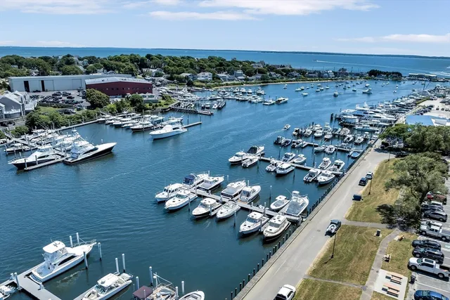 an aerial view of a house with a table and chairs