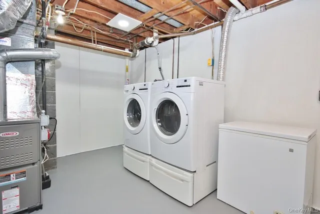 a view of a big room with closet and chandelier