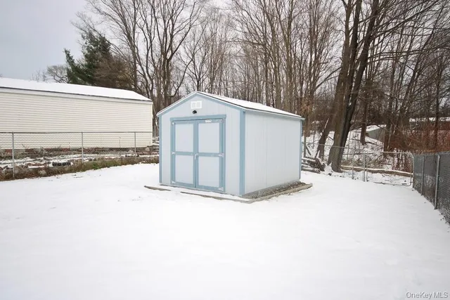 a view of a back yard of the house