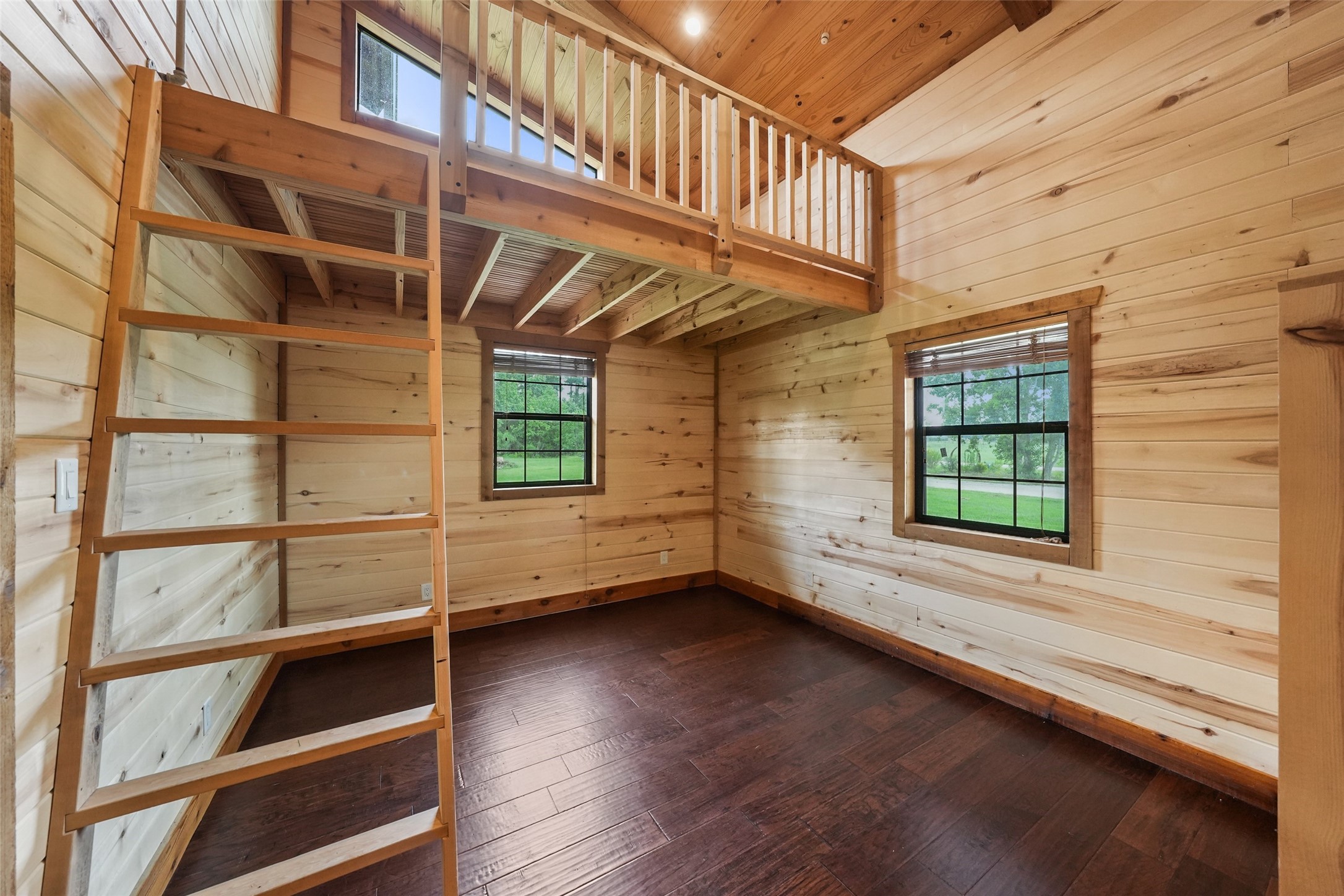 26534 Mitchell Road Hempstead, TX 77445 - Photo 21 of 45 a view of a room with wooden floor and windows