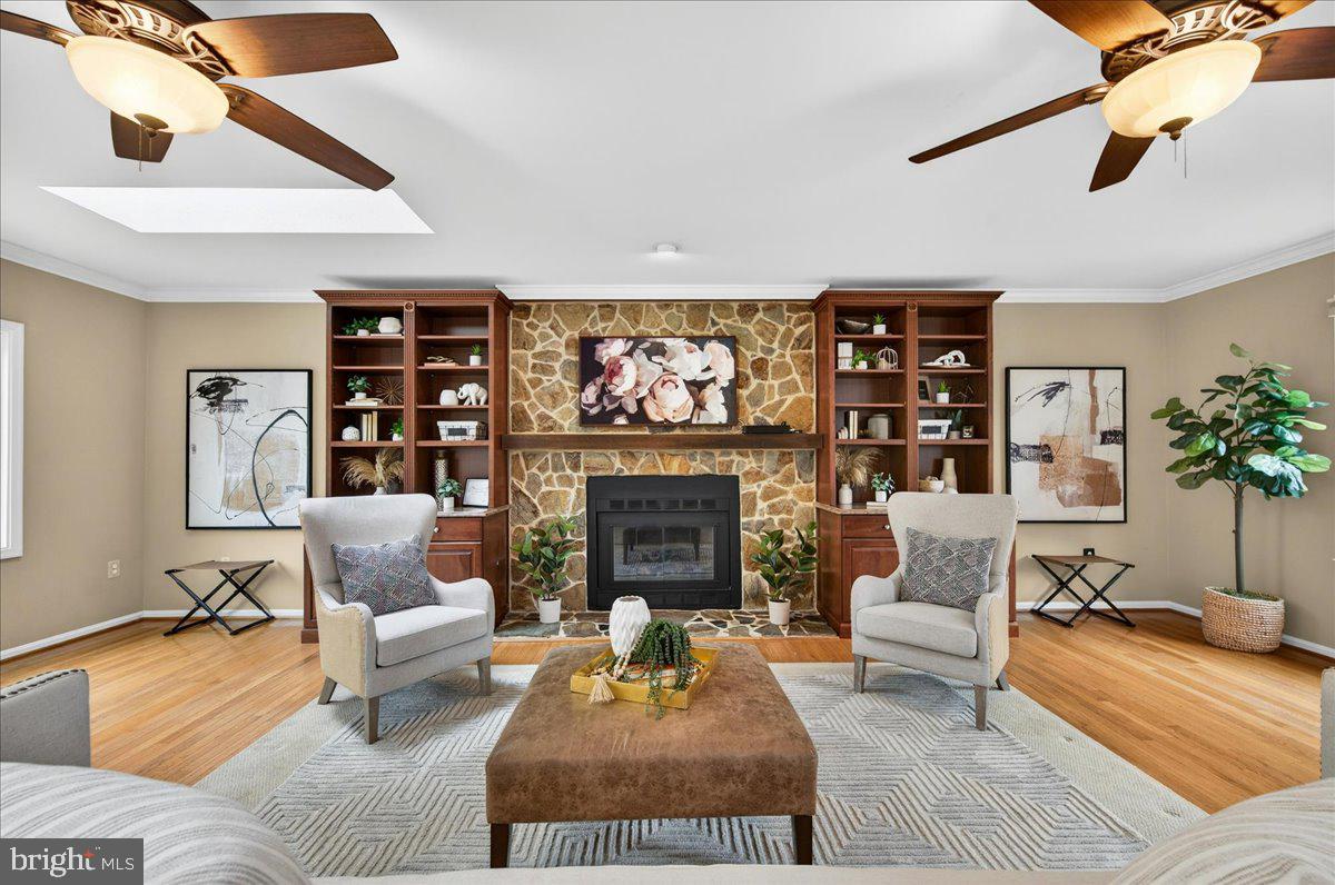 7723 Silver Sage Court Springfield, VA 22153 - Photo 16 of 63 a living room with furniture and a fireplace