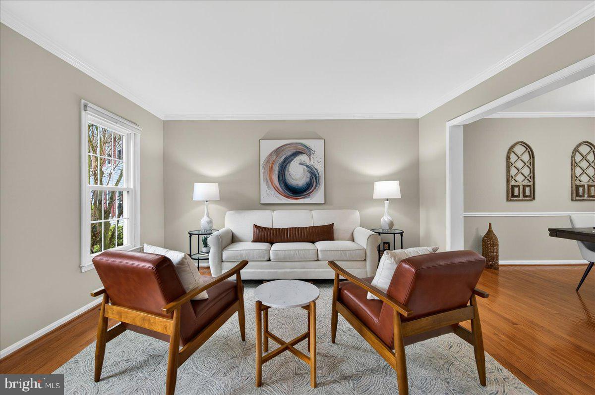 7723 Silver Sage Court Springfield, VA 22153 - Photo 23 of 63 a living room with furniture a lamp and a window