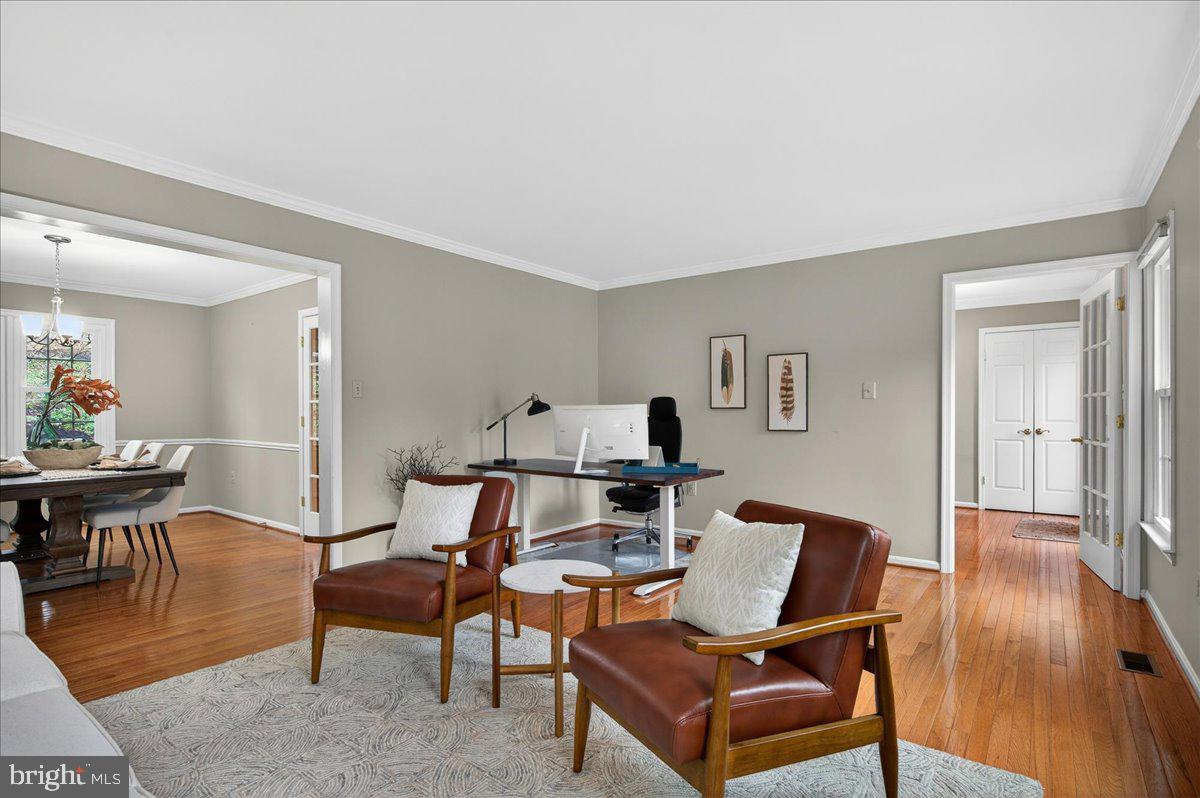 7723 Silver Sage Court Springfield, VA 22153 - Photo 25 of 63 a view of a livingroom with furniture and wooden floor