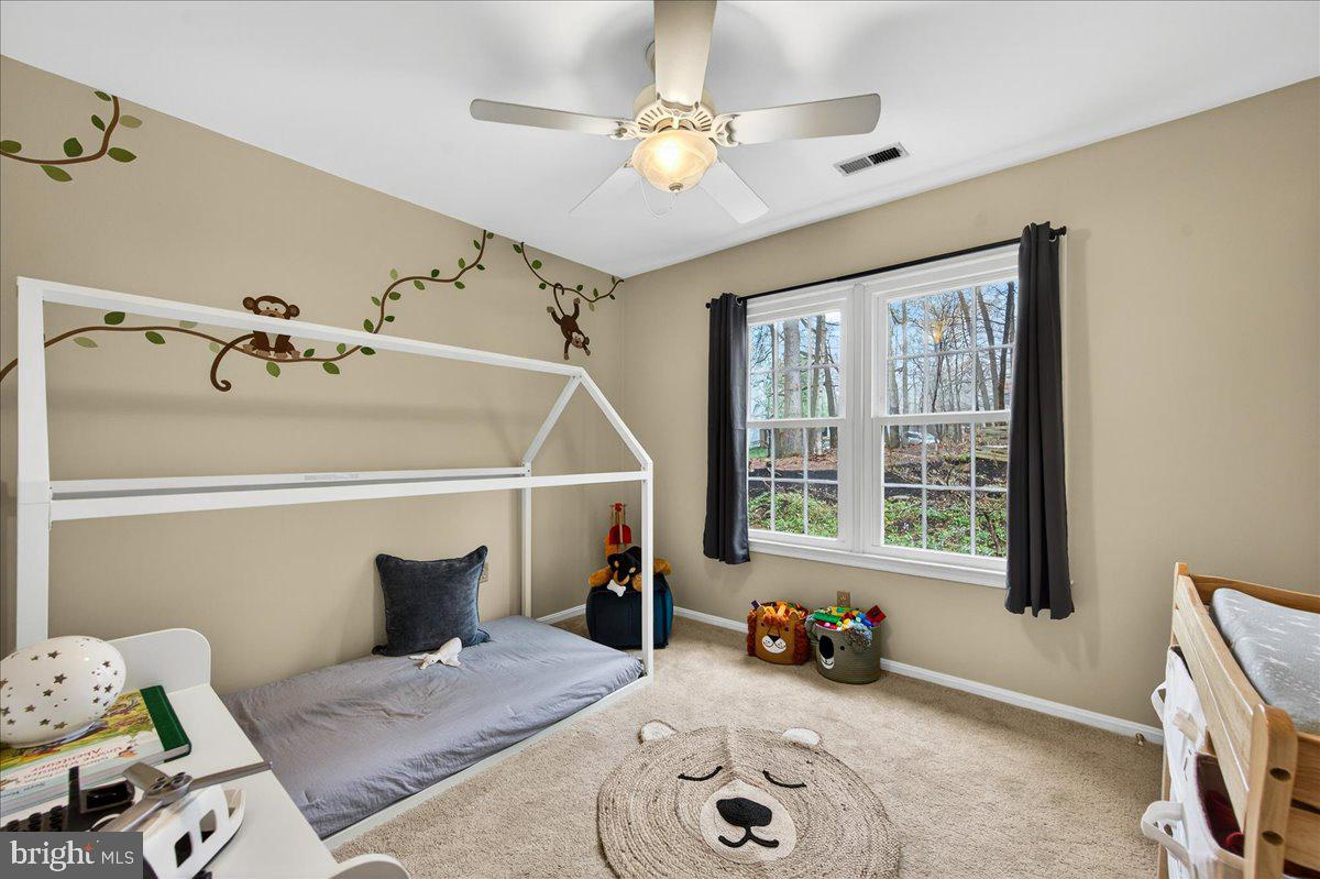 7723 Silver Sage Court Springfield, VA 22153 - Photo 42 of 63 a bedroom with furniture and a window