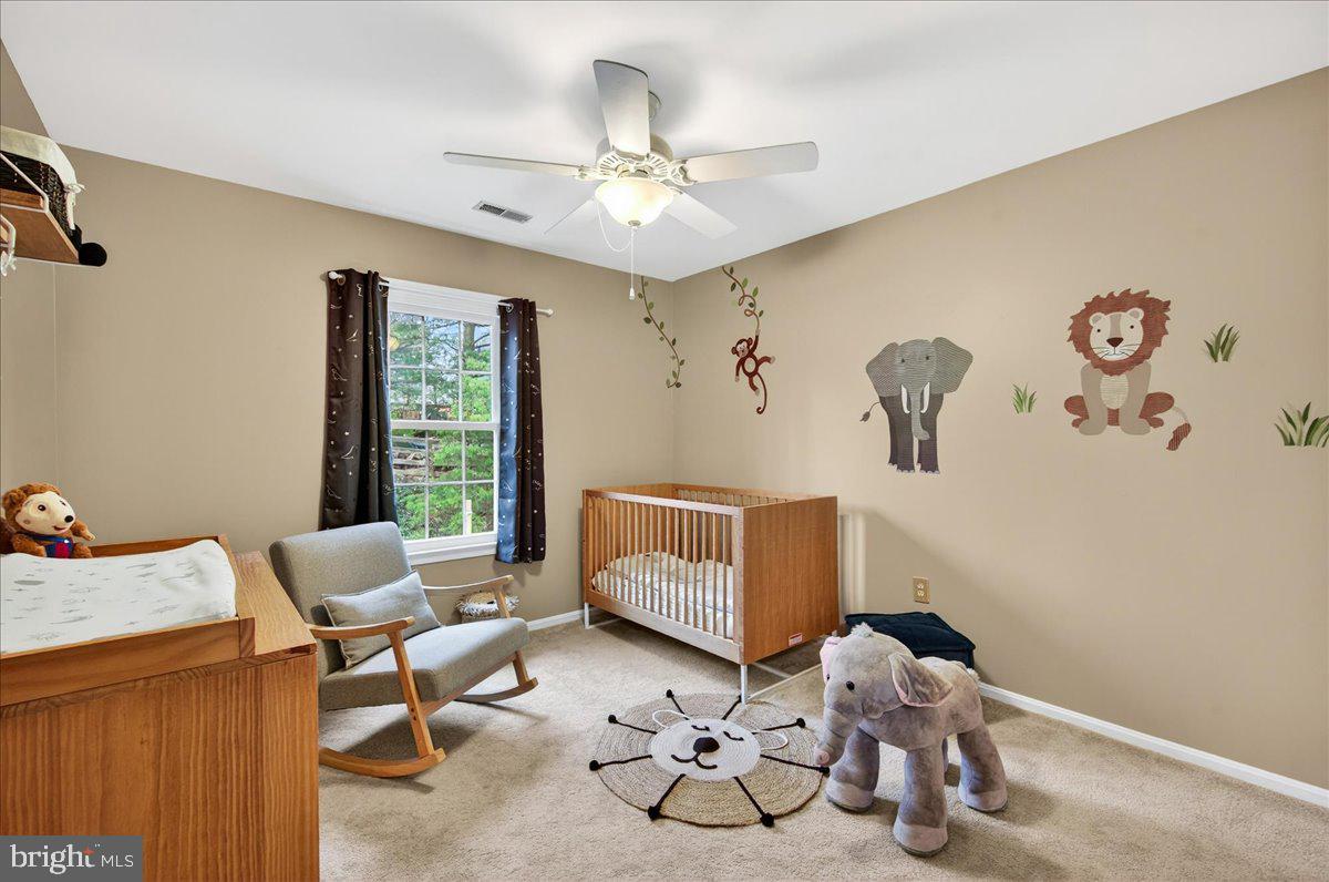 7723 Silver Sage Court Springfield, VA 22153 - Photo 45 of 63 a living room with furniture and decor