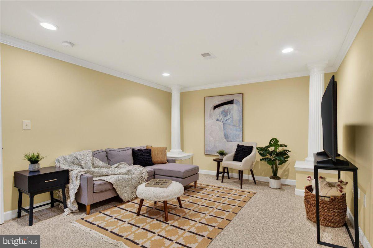 7723 Silver Sage Court Springfield, VA 22153 - Photo 47 of 63 a living room with furniture and a flat screen tv