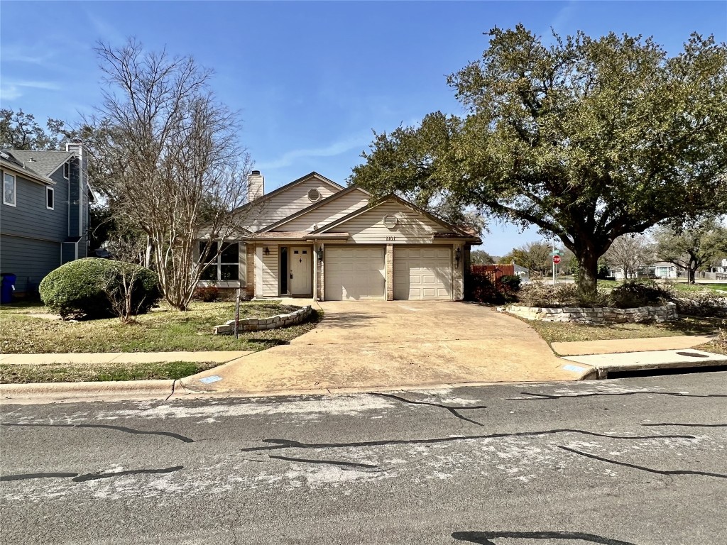 a house with trees in the background