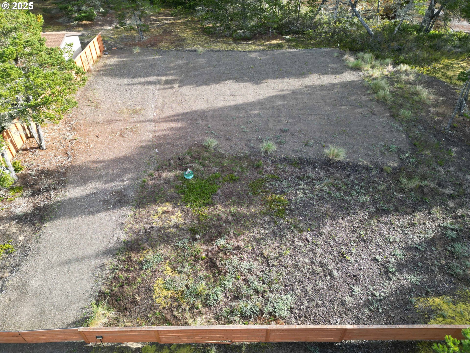 Nordahl Road Florence, OR 97439 - Photo 3 of 20 a view of a yard with wooden fence