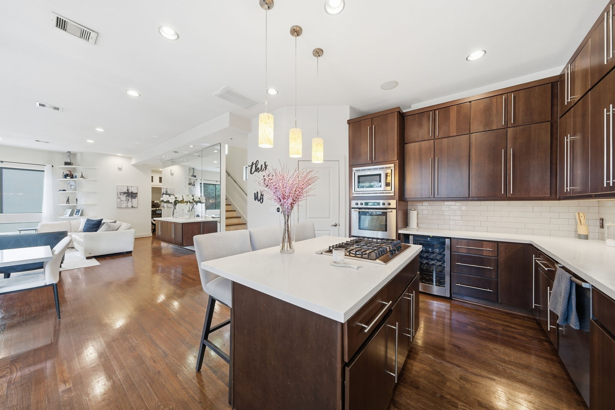 4129 Dickson Street Houston, TX 77007 - Photo 14 of 36 a kitchen with a stove a refrigerator and a sink